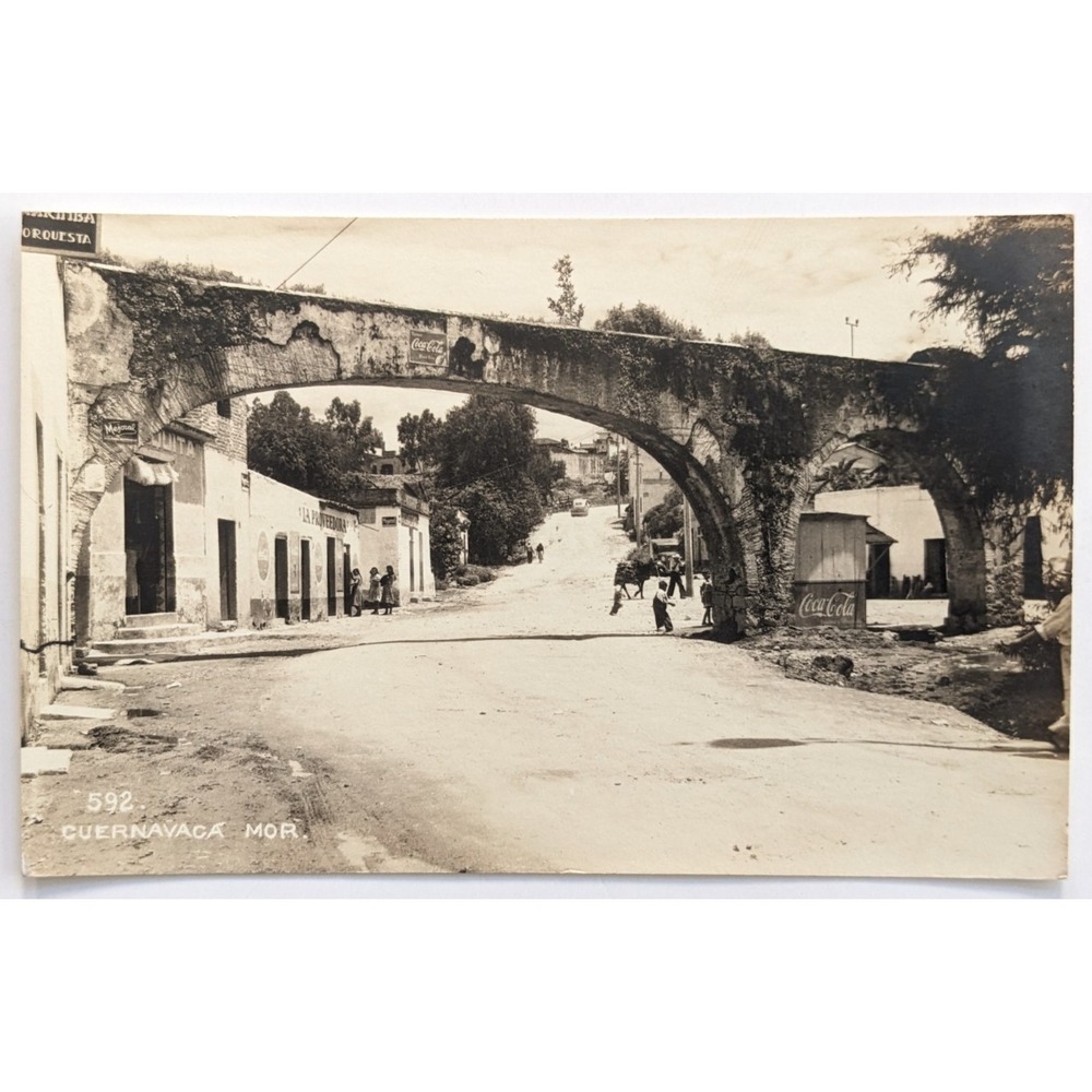 Cuernavaca, Mexico Street View Stone Arch & Coca-Cola Signs 1940s RPPC Postcard‎